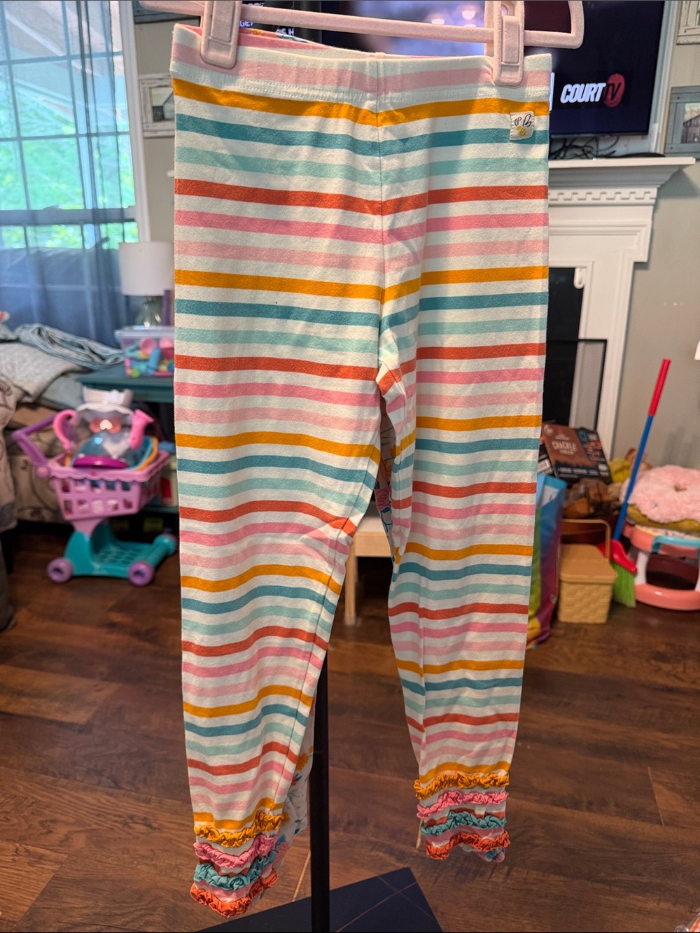 Wildflowers Multicolor Striped Leggings in Pink, Teal, Yellow, Orange.